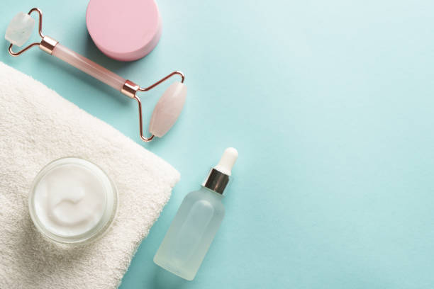 istock Skin care products blue background. 2176392843