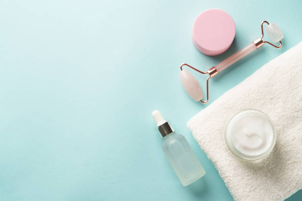 istock Skin care products blue background. 2176392849