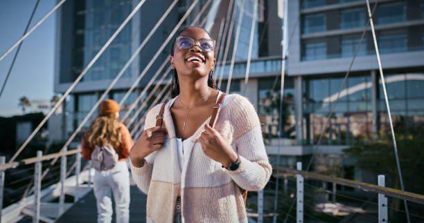 istock Student, learning and thinking with woman and walking for education, future and knowledge. University, inspiration and youth development with person at college for scholarship, vision and studying 2176396494