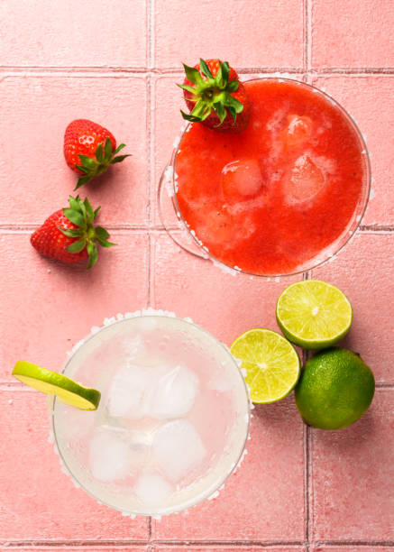 istock Margarita cocktail drink. Classic and strawberry margaritas. 2176397849