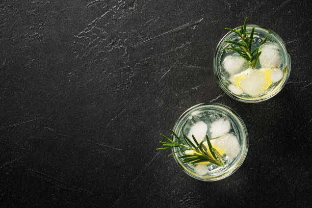 istock Gin tonic with gin, tonic, ice cubes, lime and rosemary. 2176397952