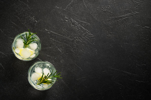 istock Gin tonic with gin, tonic, ice cubes, lime and rosemary. 2176397961