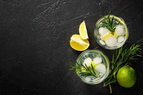 istock Gin tonic with gin, tonic, ice cubes, lime and rosemary. 2176397972