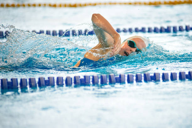 istock Swimmer swims freestyle swimming style in the pool 2176408496