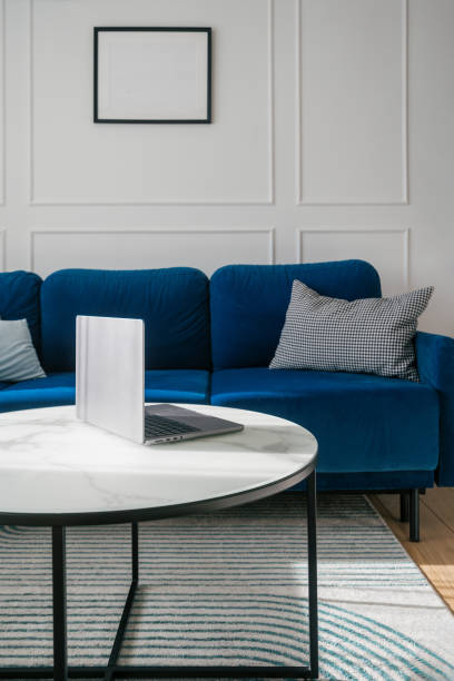 istock Blue sofa and coffee table in modern living room 2176414108