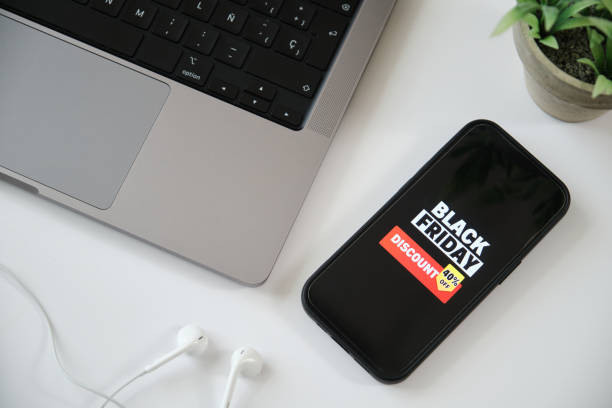 istock Smartphone is showing a black friday discount on its screen 2176420023
