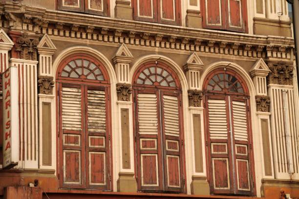 istock Old colonial building facade with arched windows 2176420305