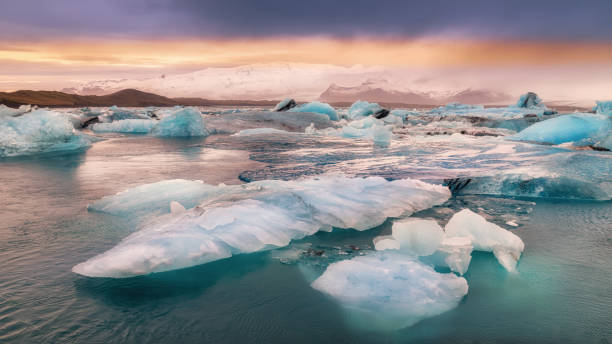 istock sunset in a glacial lagoon under the iceberg 2176421733