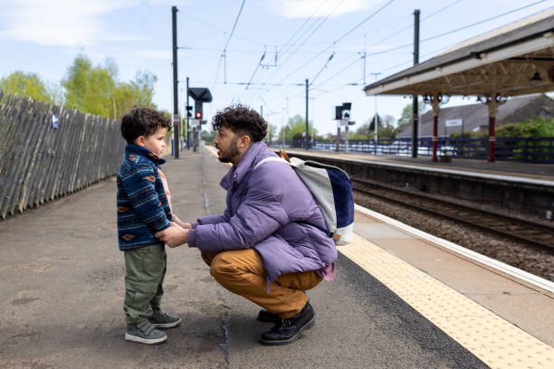 istock A Father Teaching Railway Safety with Son 2176423517