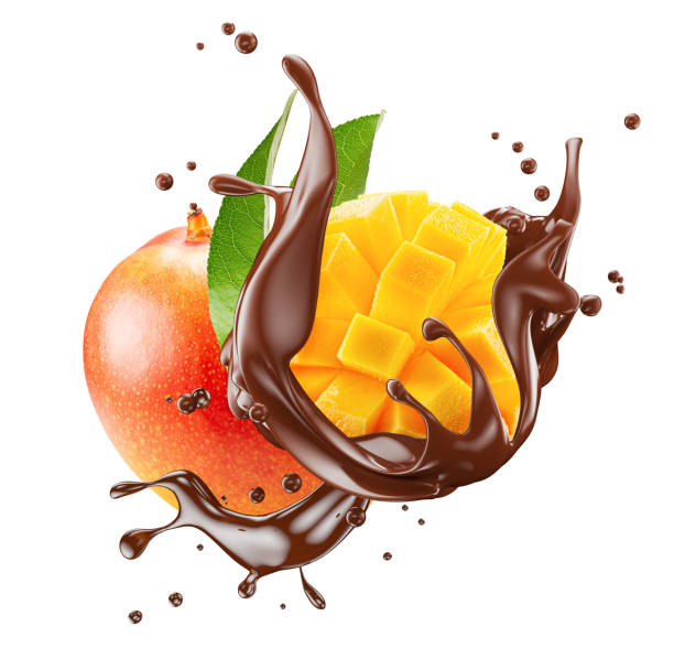 istock mango with chocolate splash isolated on a white background. Clipping path 2176425170