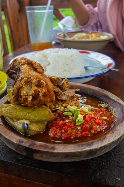 istock Fried chicken with chili sauce and eggplant on layah 2176430948