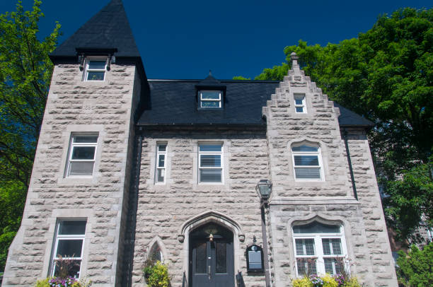 a generic stone building in the old area of quebec city canada on a sunny day.