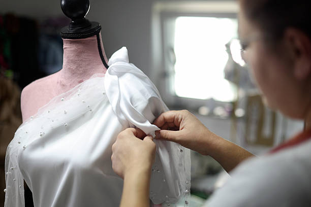 istock Fixing a wedding dress 2176431970
