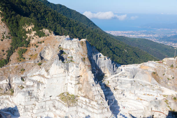 Colonnata di Carrara, Italy - August 08, 2024: marble extraction in Carrara marble quarry, the same marble of the David by Michelangelo
