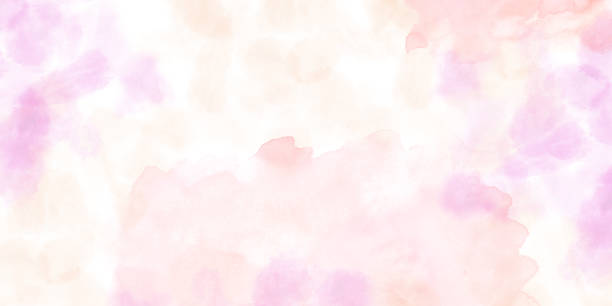 istock Abstract gentle pink yellow textured watercolor splashes, stains horizontal banner isolated on white. Hand drawn illustration in pastel colors. Brushed paint background. Empty space for text. 2176440065