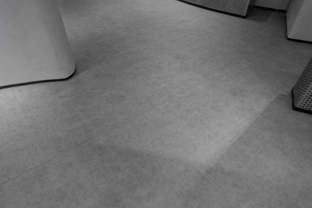 Looking down on concrete walls and concrete floors