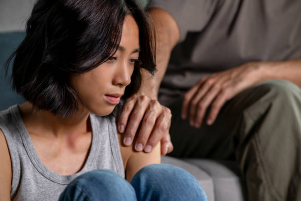 istock Male and female couple going through hard times in relationship problem, showing each other consoling touches, comfort, hugs and soothing gestures 2176446341