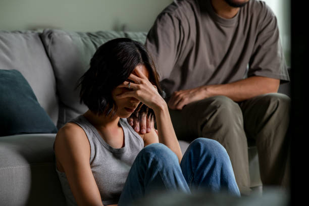 istock Male and female couple going through hard times in relationship problem, showing each other consoling touches, comfort, hugs and soothing gestures 2176446349