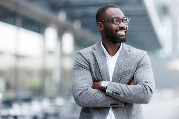 istock Confident businessman standing outdoors with a smile 2176447461
