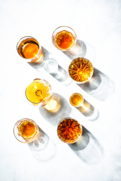 istock Strong alcohol drink. Whisky, rum, tequila, cognac at white background. 2176448175
