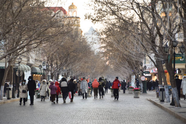 Harbin, China - January 5 2021: Zhongyang Dajie, Central Street in winter time in Harbin