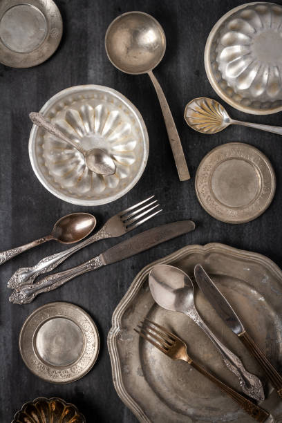 istock Vintage pewter plates, bowls and cutlery 2176456301