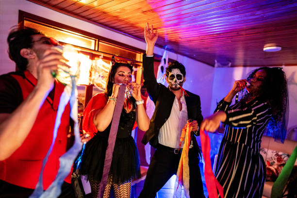istock Friends dancing and having fun during Halloween party 2176462064