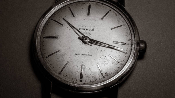 vintage old fashioned retro watch close up ,  texture , macro , black and white photo