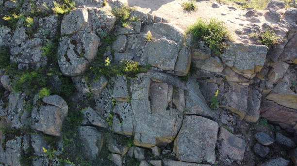 istock Sheer stone rock, aerial view. Boulders from a bird's eye view. 2176472014