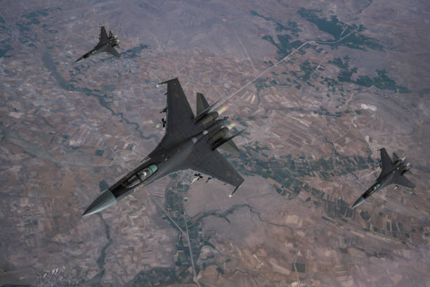 istock SU-35Jet fighters flying over mountains. 2176486270