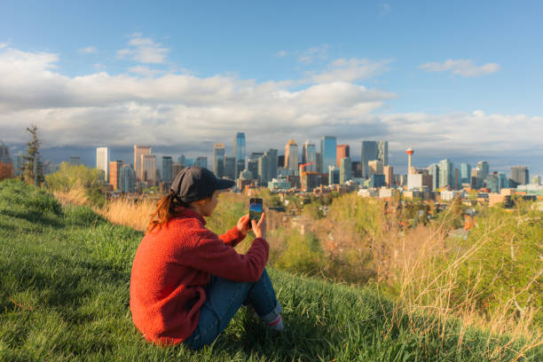 istock WOman photographing with smartphone 2176486355