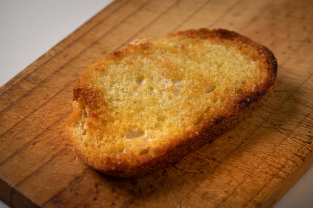 Bruschetta preparation, toasted bread.