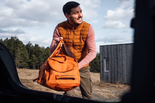istock Man Packing for a Scenic Mountain Vacation Adventure 2176509866