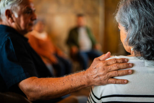 istock Close-up of a people giving support to patient during group therapy session 2176511213