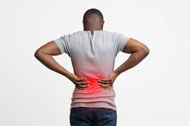 istock Black man holding his hands behind his back 2176511899