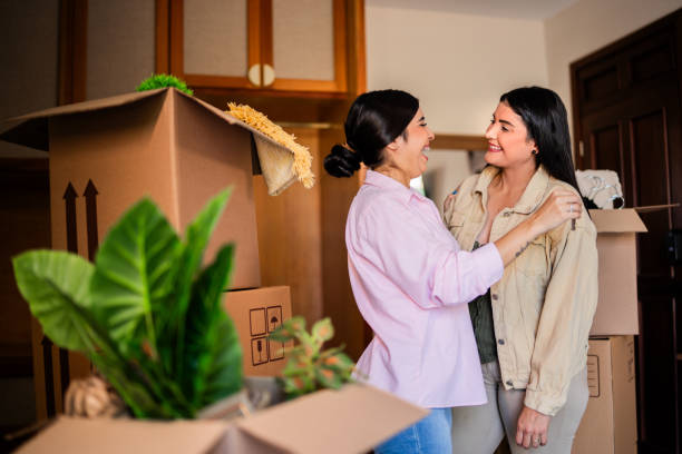 istock Lesbian couple talking embraced at home 2176514372