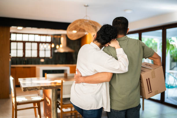 istock Couple embraced looking the new house 2176514662