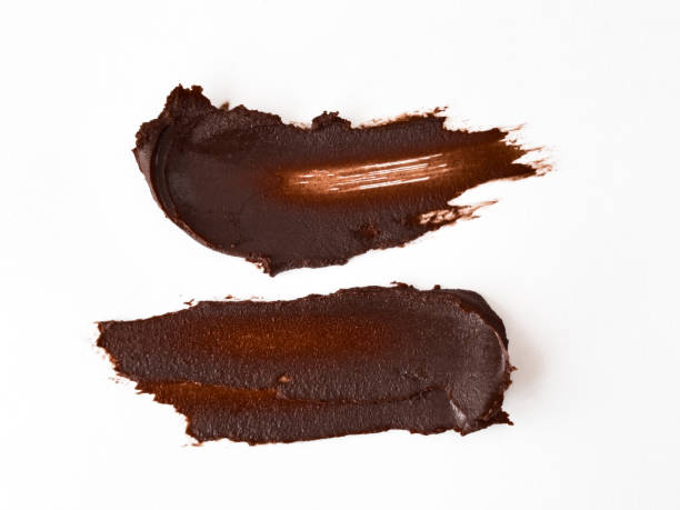 istock Chocolate brown paint strokes on white background 2176519193