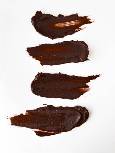 istock Artistic chocolate spread streaks on white background for food design 2176519195