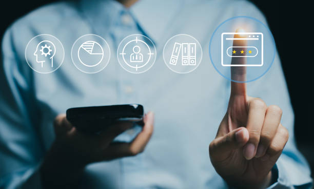 istock Person using smartphone with digital icons, representing innovation and technology solutions. 2176541399