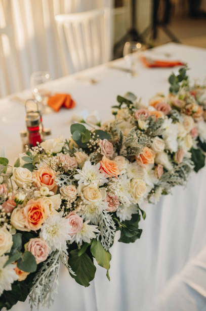 istock Table setting for an event party or wedding reception. Fresh flower table decoration 2176544263