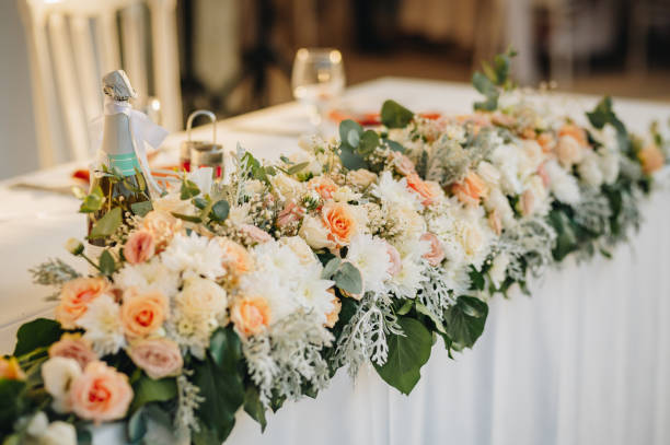 istock Table setting for an event party or wedding reception. Fresh flower table decoration 2176544264