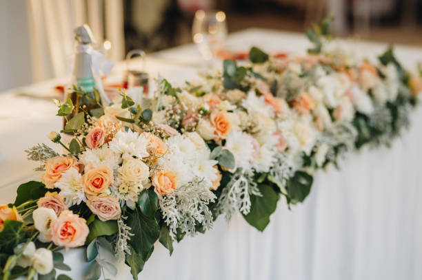 istock Table setting for an event party or wedding reception. Fresh flower table decoration 2176544268