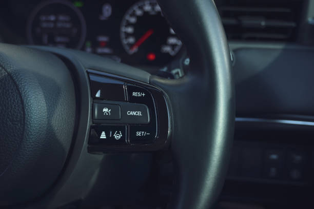 istock interior view of car with black leather, steering wheel with button 2176555031