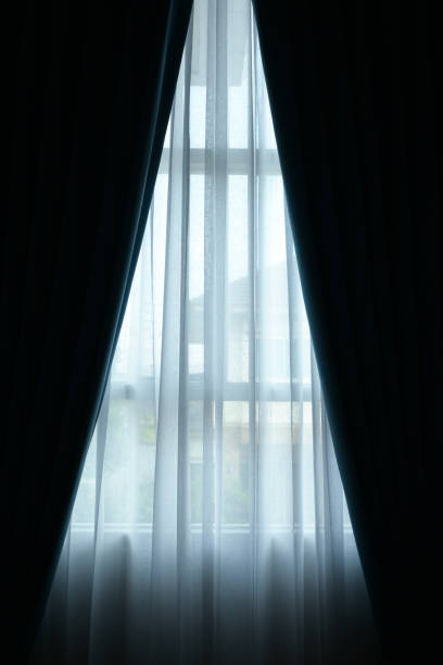 istock black and white curtain on the window in home, interior design 2176558802