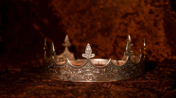 istock Royal men's medieval crown on velevet background 2176559357