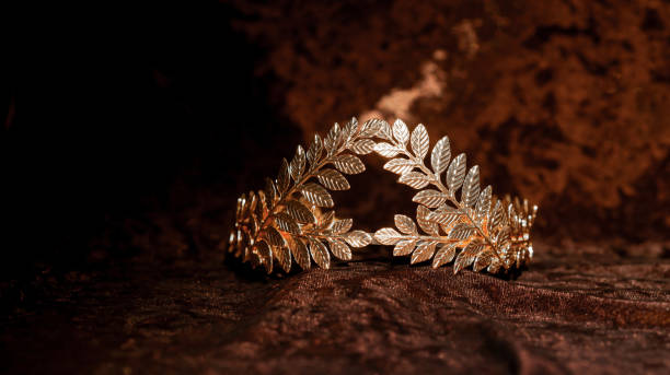 istock Laurel wreath, golden accessory on velvet background 2176559361
