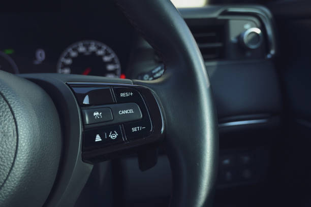 istock interior view of car with black leather, steering wheel with button 2176563729
