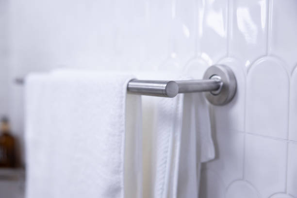 istock White towels on a clothes rack in the bathroom 2176566807