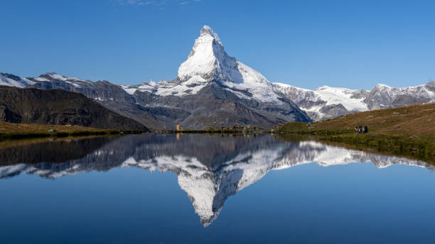 Gorgeous alpine lake with its clear reflections of Matterhorn mountain that is a distinctive pyramid-shaped peak in the Swiss Alps, Zermatt, Switzerlan